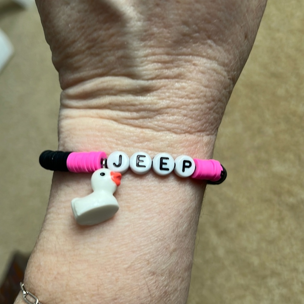 Handcrafted bracelet. New. Clay beads. Duck charm.